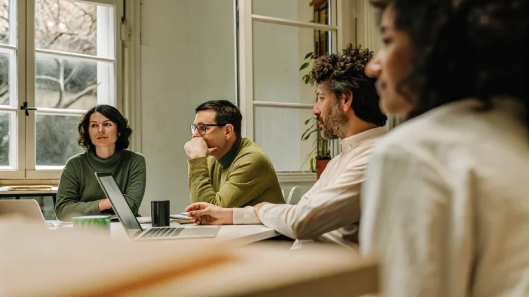 HR professionals discussing employee engagement in a workplace meeting